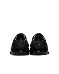 Slippers en cuir noirs Maison Margiela