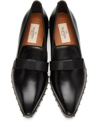 Slippers en cuir noirs Valentino