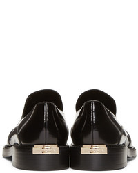 Slippers en cuir noirs Burberry