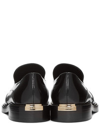 Slippers en cuir noirs Burberry