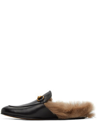 Slippers en cuir noirs Gucci