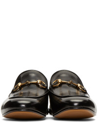 Slippers en cuir noirs Gucci