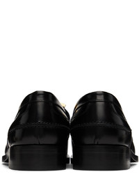 Slippers en cuir noirs Versace