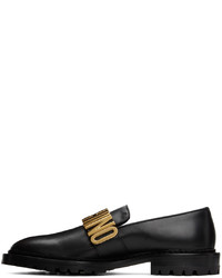 Slippers en cuir noirs Moschino