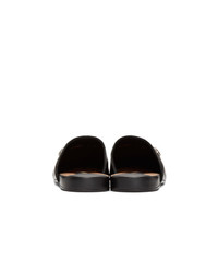 Slippers en cuir noirs Gucci