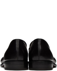 Slippers en cuir noirs Ferragamo