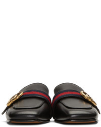 Slippers en cuir noirs Gucci