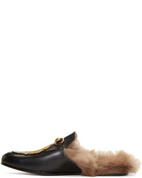 Slippers en cuir noirs Gucci