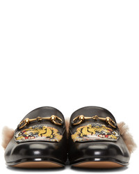 Slippers en cuir noirs Gucci