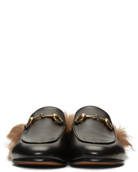 Slippers en cuir noirs Gucci