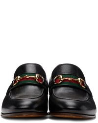 Slippers en cuir noirs Gucci