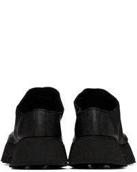 Slippers en cuir noirs Guidi