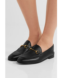 Slippers en cuir noirs Gucci