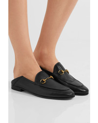 Slippers en cuir noirs Gucci