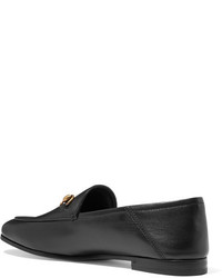 Slippers en cuir noirs Gucci