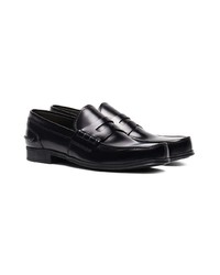 Slippers en cuir noirs Prada