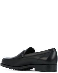 Slippers en cuir noirs Tod's