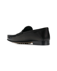 Slippers en cuir noirs Tod's