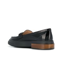 Slippers en cuir noirs Tod's