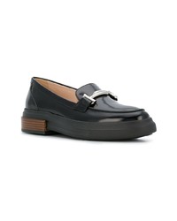 Slippers en cuir noirs Tod's