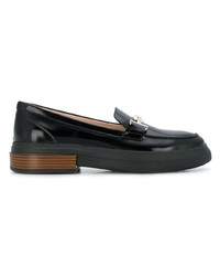 Slippers en cuir noirs Tod's