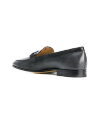 Slippers en cuir noirs Tod's