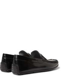 Slippers en cuir noirs Tod's