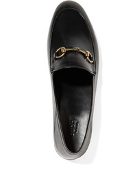 Slippers en cuir noirs Gucci