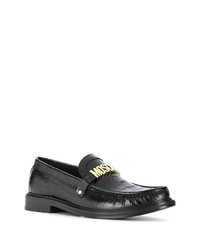 Slippers en cuir noirs Moschino