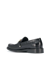 Slippers en cuir noirs Moschino