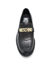 Slippers en cuir noirs Moschino