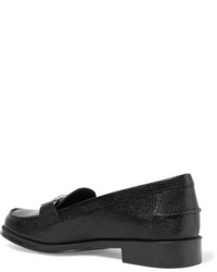 Slippers en cuir noirs Tod's