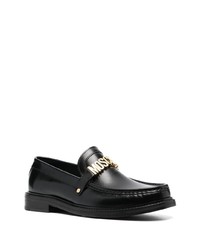 Slippers en cuir noirs Moschino