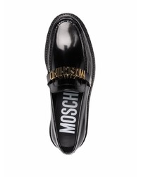 Slippers en cuir noirs Moschino