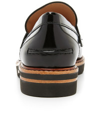 Slippers en cuir noirs Stuart Weitzman