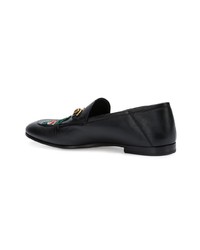 Slippers en cuir noirs Gucci