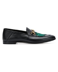 Slippers en cuir noirs Gucci