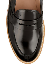 Slippers en cuir noirs Tod's