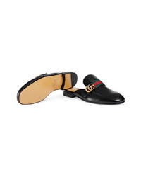 Slippers en cuir noirs Gucci