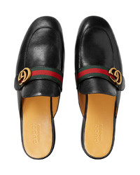 Slippers en cuir noirs Gucci