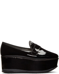 Slippers en cuir noirs Repetto