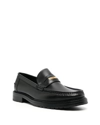 Slippers en cuir noirs Moschino