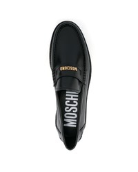 Slippers en cuir noirs Moschino