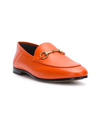 Slippers en cuir orange Gucci
