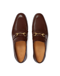 Slippers en cuir ornés marron foncé Gucci