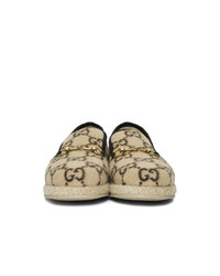 Slippers en toile imprimés marron clair Gucci