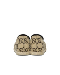 Slippers en toile imprimés marron clair Gucci