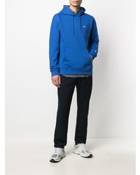 Sweat à capuche en polaire bleu Tommy Jeans