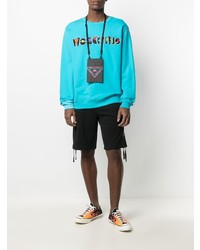 Sweat-shirt brodé turquoise Moschino