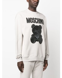 Sweat-shirt en polaire imprimé gris Moschino